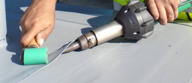 Person using heat gun